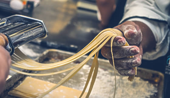 Apprentice making fresh pasta