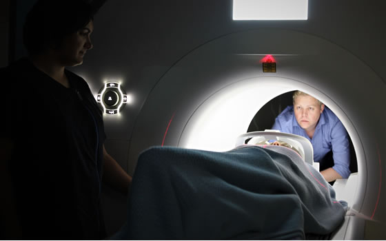 A medical student prepares for an MRI scan