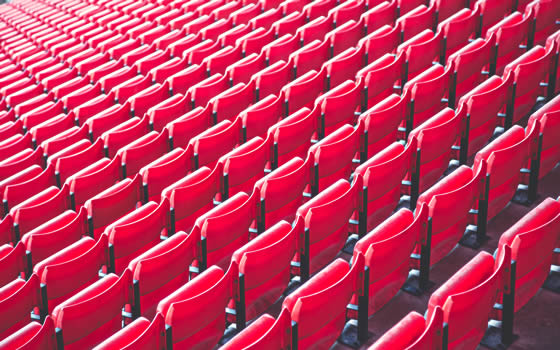 Empty stadium seats await graduation