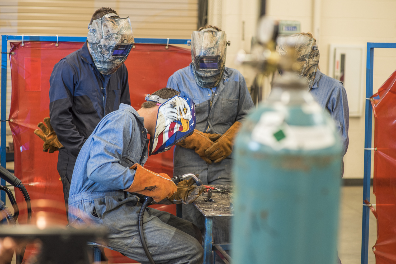 Group of four welding students