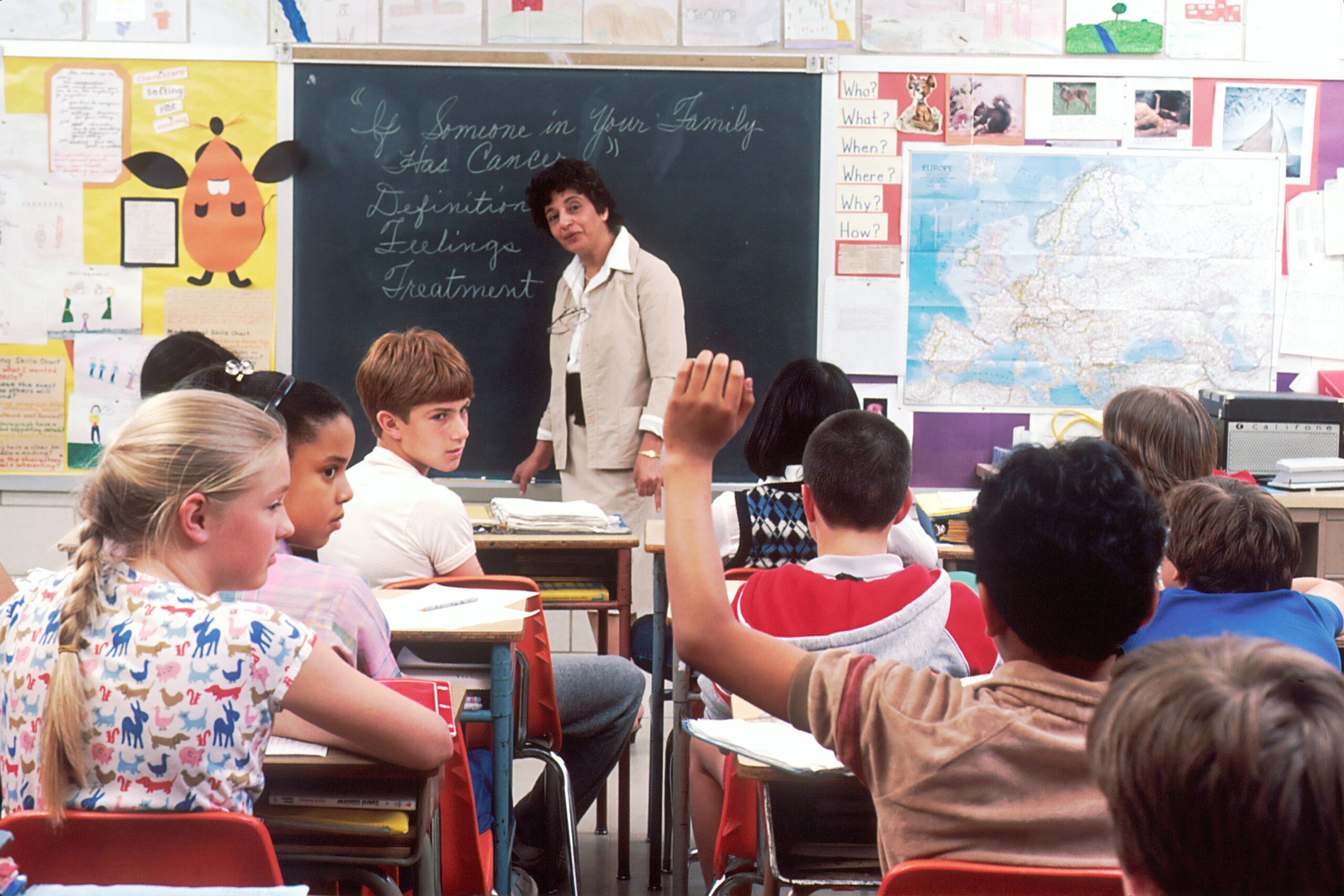 teacher in front of a class of students