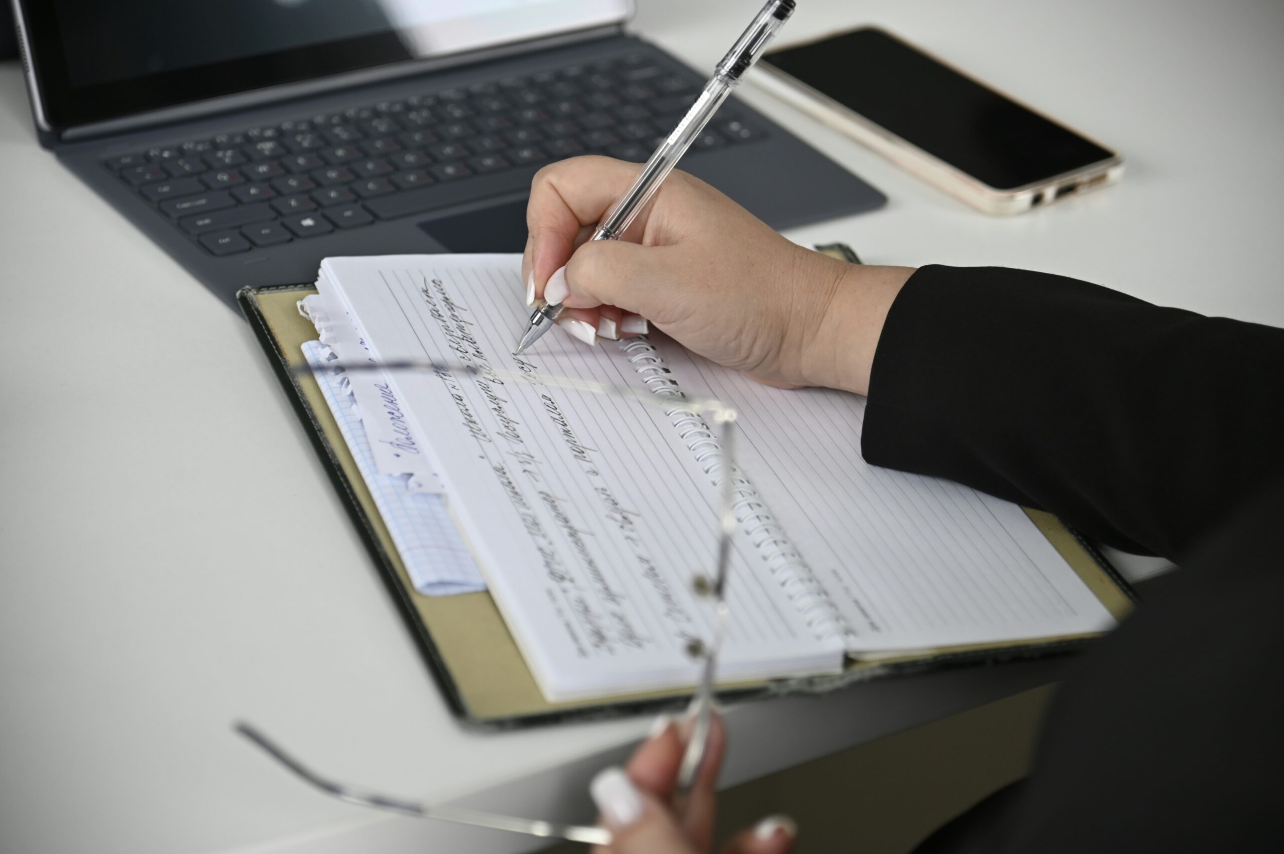 auditor jotting down notes