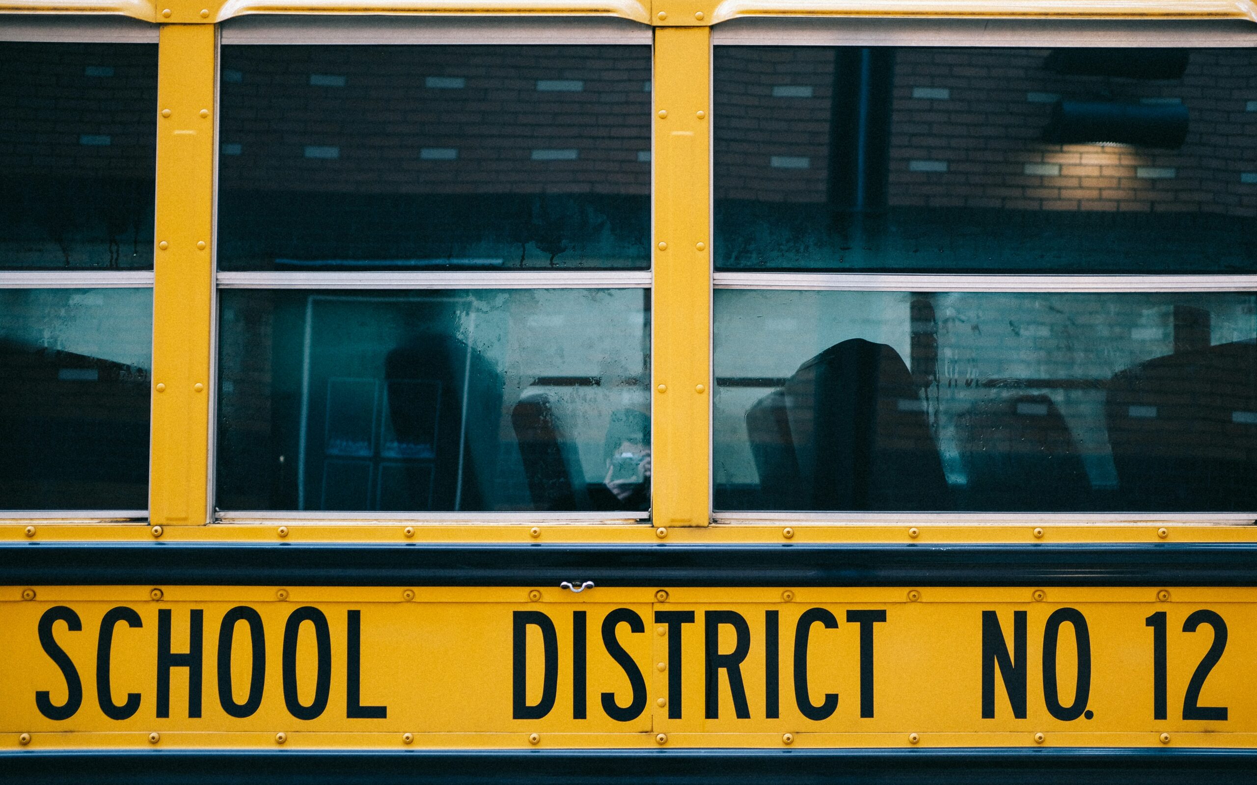 side of a yellow school bus