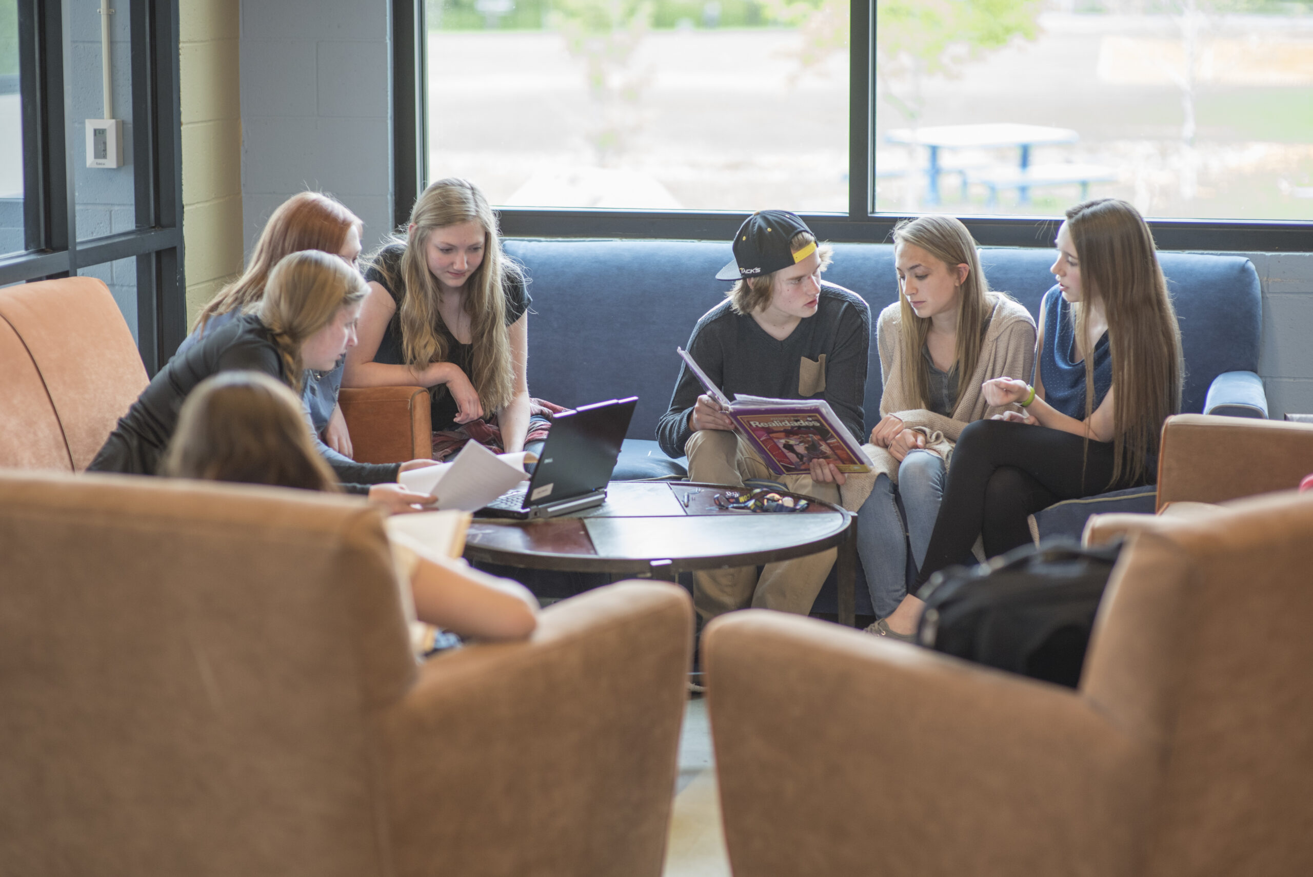 seven students studying together